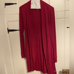 DKNY long open front cardigan. Vivid cranberry red, side pockets & ribbed trim.